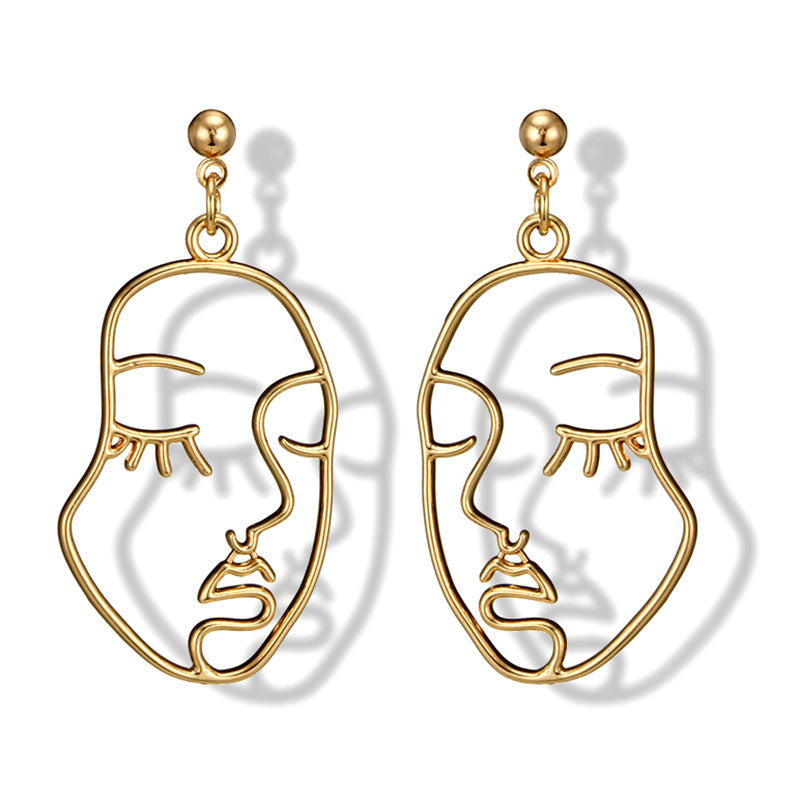 Hollowed Out Human Face Art Deco Earrings